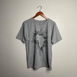 Re-worked grey Africa rip curl tee about a size medium